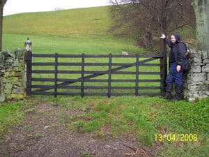 duncan showing oxygen cylinders as gate posts- mw11